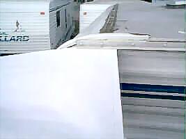 Feed the fabric into the slide topper awning rail. Feed the fabric into the slide topper awning rail.