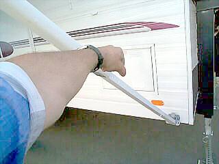 then release the lever to lock the awning.