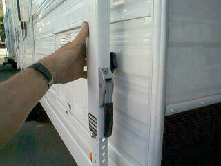 Loosen the RV awning rafter knobs...