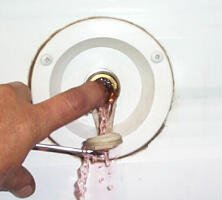 Press in on the valve ...